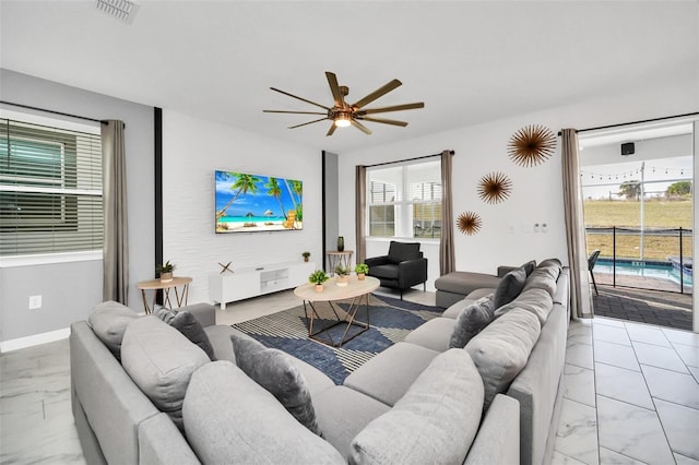 living room with ceiling fan