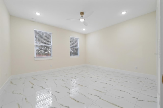 unfurnished room with ceiling fan