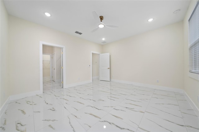 empty room featuring ceiling fan