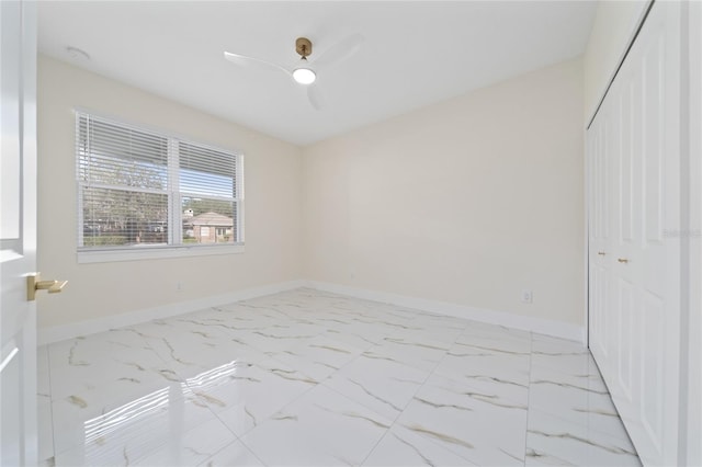 empty room featuring ceiling fan