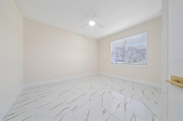 spare room featuring ceiling fan