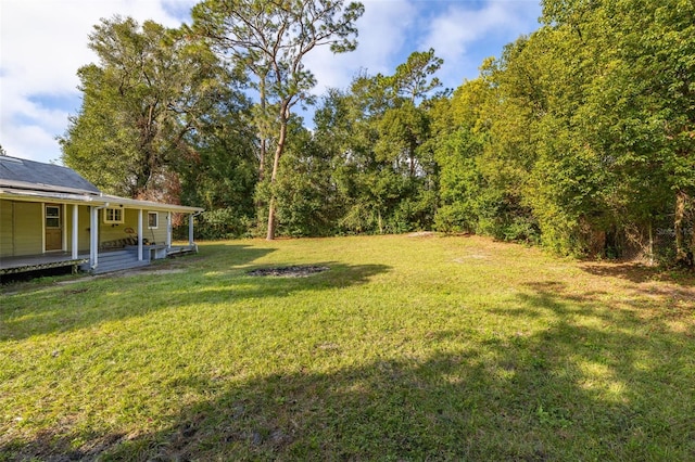 view of yard with a porch