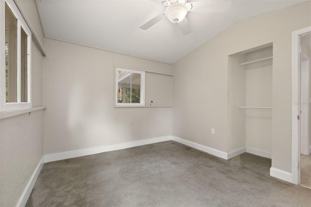 unfurnished bedroom featuring ceiling fan and lofted ceiling