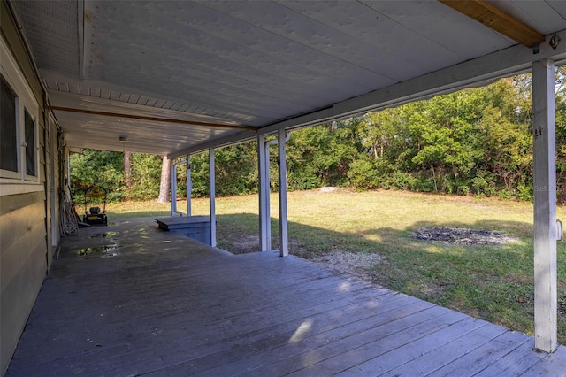 wooden deck with a yard