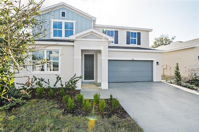 view of front of property featuring a garage