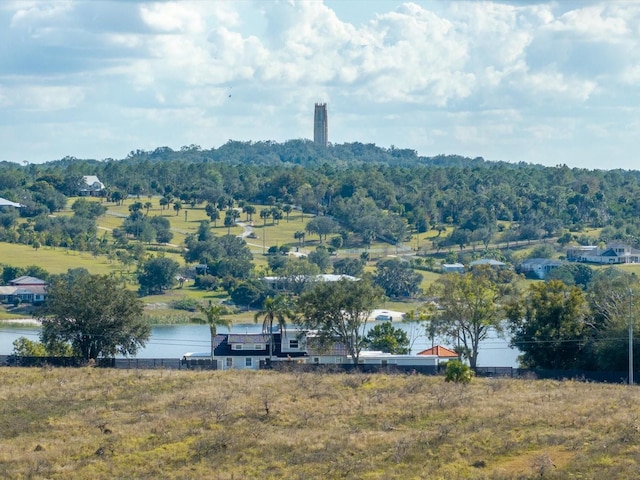 exterior space with a water view and a rural view