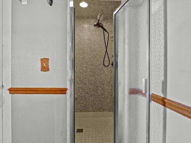 bathroom featuring walk in shower