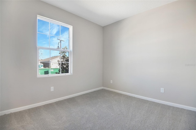 view of carpeted spare room