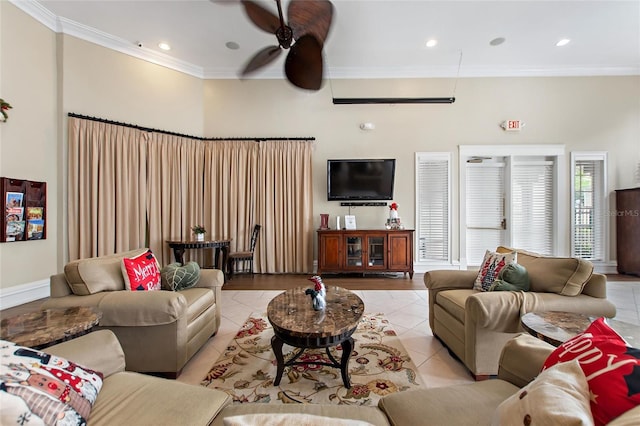 living room featuring ceiling fan, light tile patterned flooring, and ornamental molding