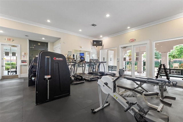 workout area with crown molding and french doors