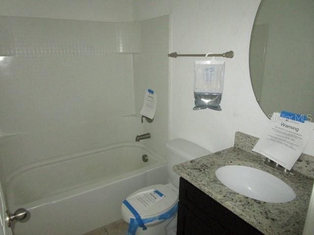 full bathroom with vanity, toilet, and shower / bathtub combination