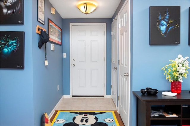 entryway featuring light tile patterned flooring