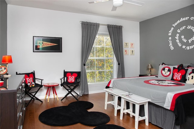 bedroom featuring wood-type flooring and ceiling fan