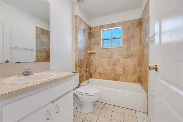 full bathroom with toilet, vanity, tile patterned floors, and tiled shower / bath combo