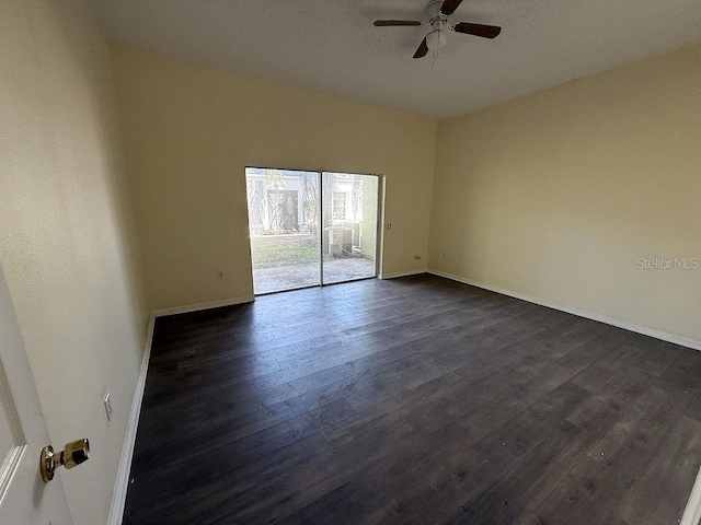 unfurnished room featuring ceiling fan and dark hardwood / wood-style flooring