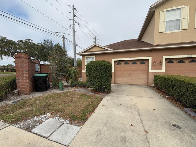 view of front of house with a garage