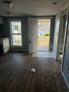 1700 Kentucky Ave, Saint Cloud, FL 34769 - doorway with dark hardwood / wood-style flooring
