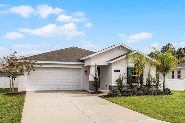 ranch-style home featuring a front yard and a garage