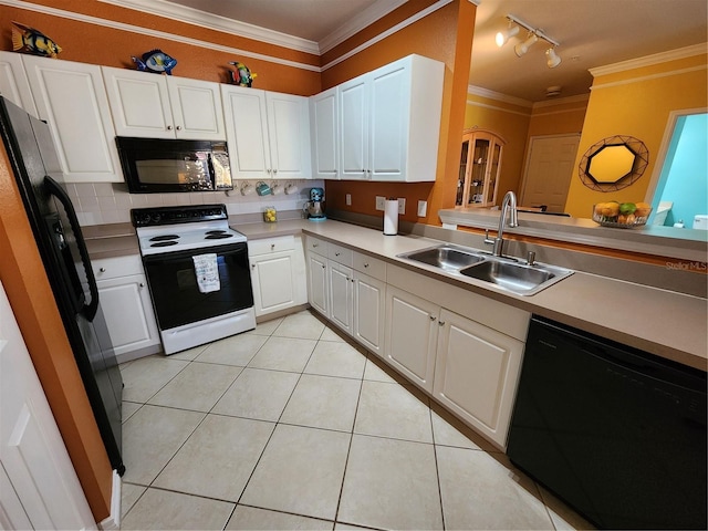 kitchen featuring tasteful backsplash, crown molding, light tile patterned floors, black appliances, and a sink