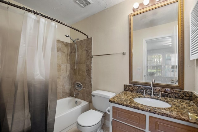 full bathroom featuring a textured ceiling, vanity, toilet, and shower / bathtub combination with curtain