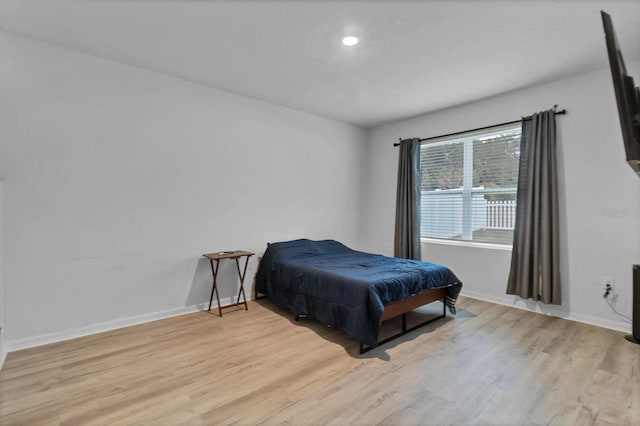 bedroom featuring light wood-type flooring