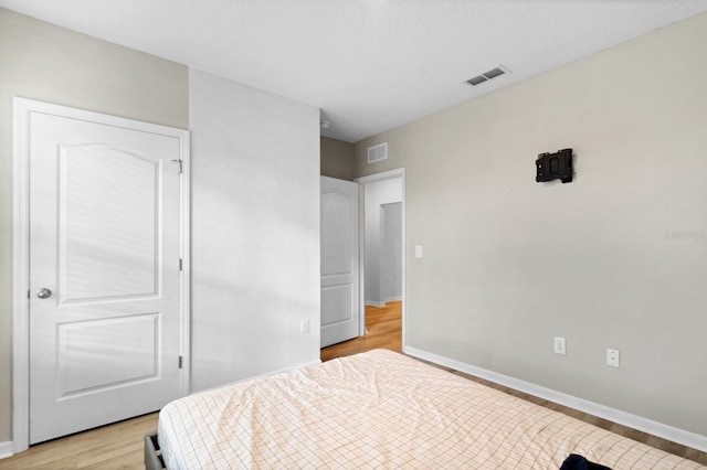 bedroom featuring light hardwood / wood-style floors