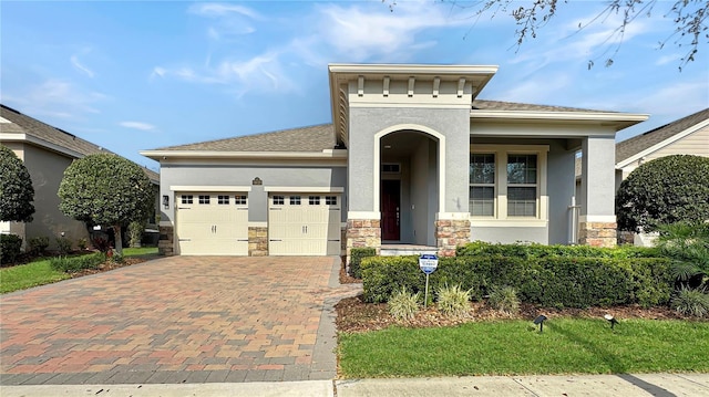 view of front of property featuring a garage