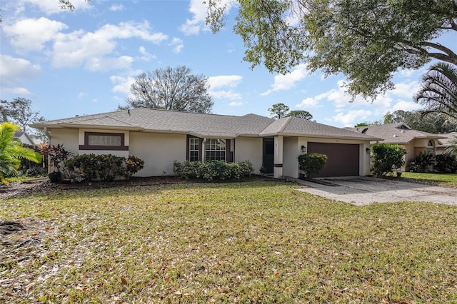 ranch-style home featuring a garage and a front lawn