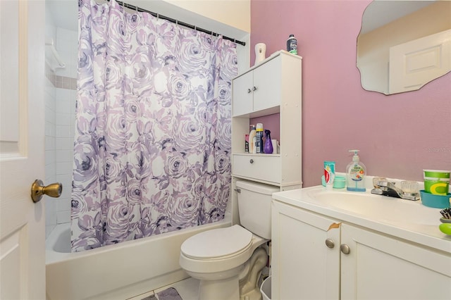 full bathroom with shower / bath combo with shower curtain, vanity, and toilet