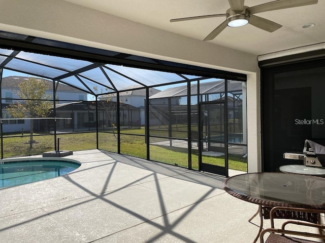 sunroom / solarium featuring plenty of natural light