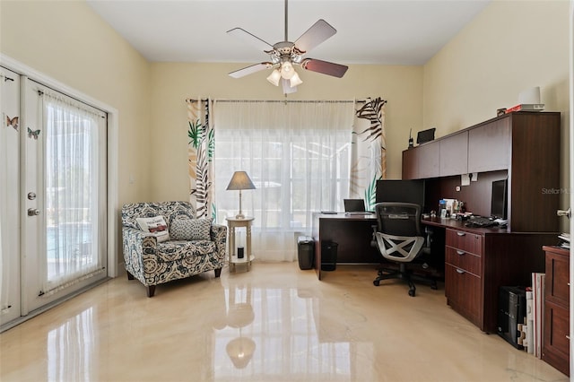 home office with ceiling fan and french doors