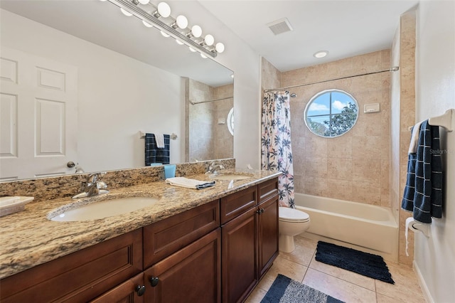 full bath featuring tile patterned flooring, visible vents, a sink, and shower / bath combo