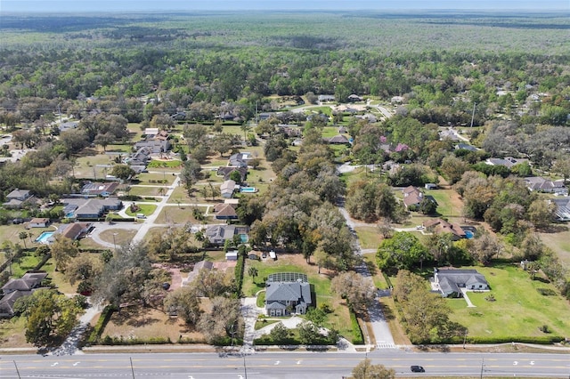 bird's eye view with a forest view