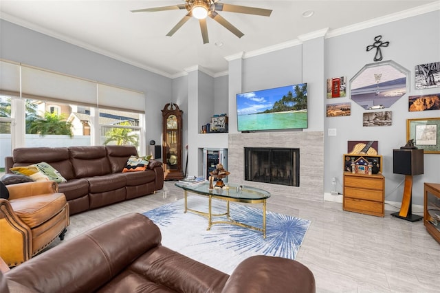 living room featuring ceiling fan and crown molding