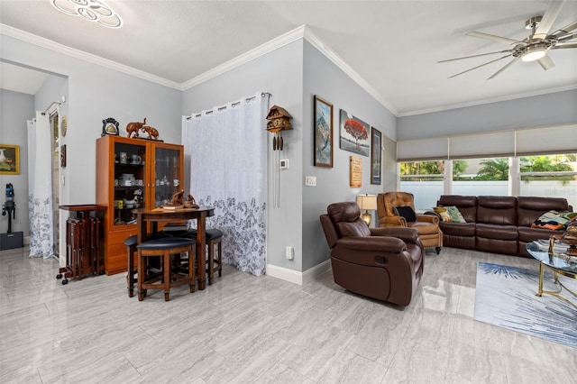 living room with ceiling fan and ornamental molding