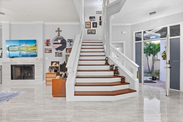 stairway with crown molding