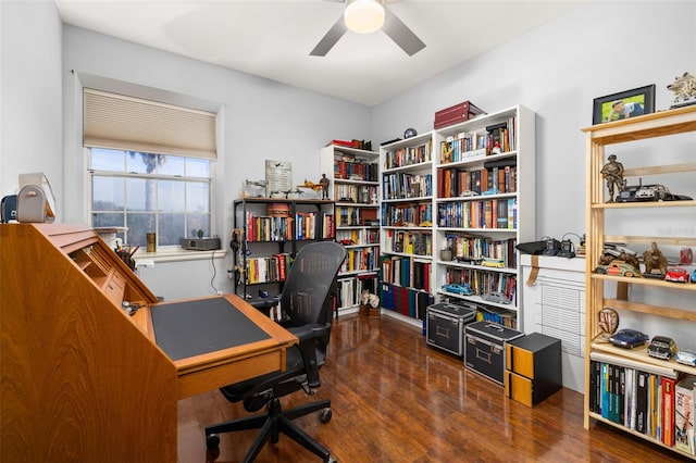 office featuring dark hardwood / wood-style floors and ceiling fan