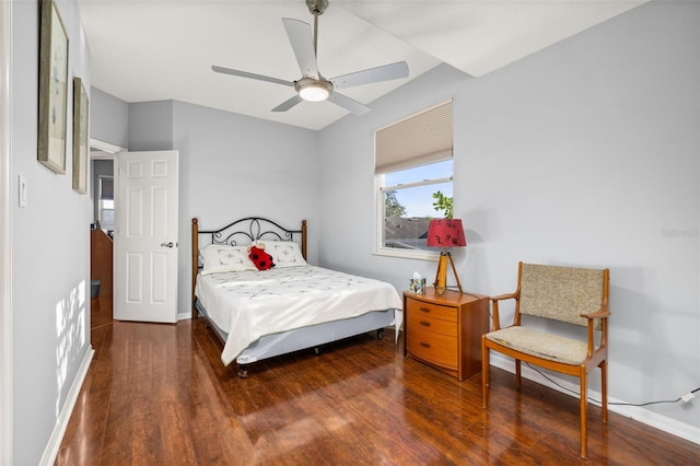 bedroom with ceiling fan and dark hardwood / wood-style flooring