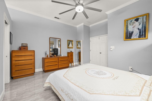 bedroom with a closet, ceiling fan, and crown molding