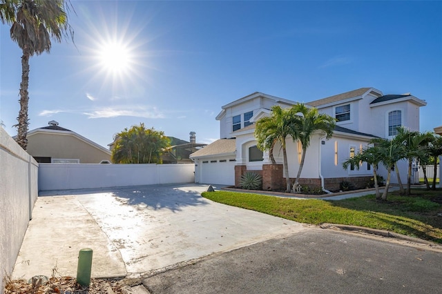 view of front of property featuring a garage