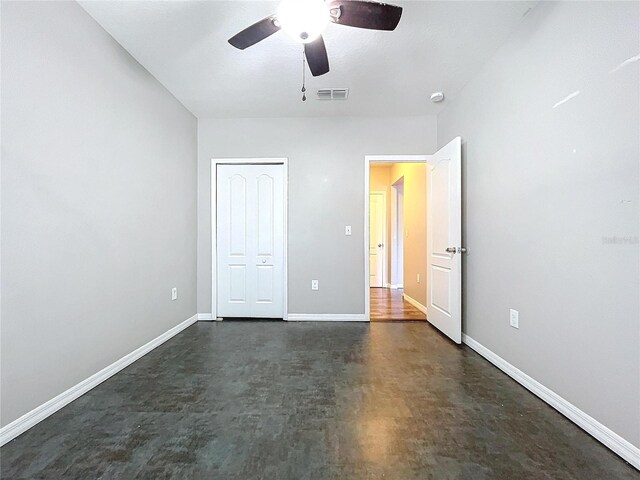 unfurnished bedroom featuring a closet and ceiling fan