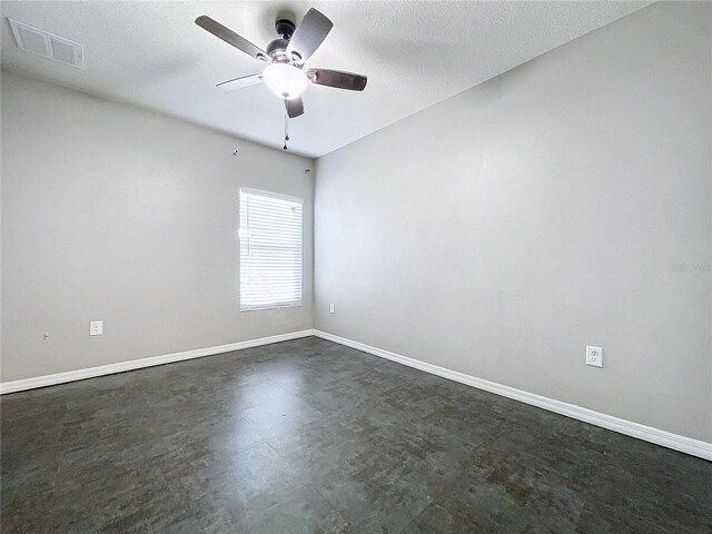 spare room featuring ceiling fan