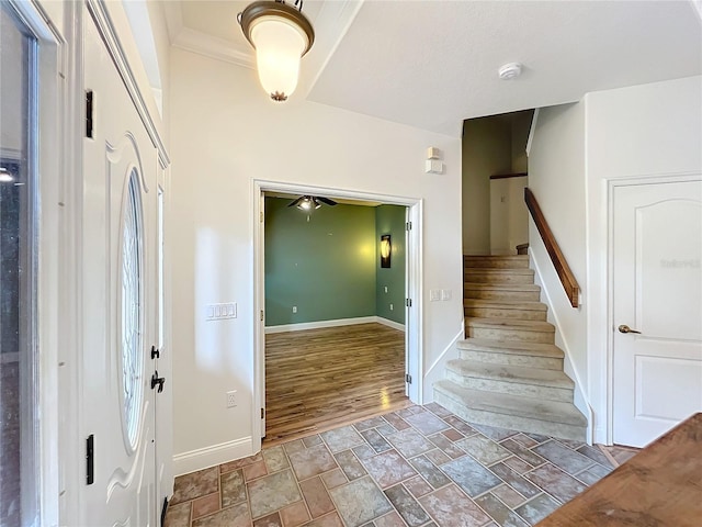 foyer entrance with ornamental molding