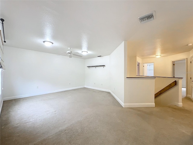 spare room featuring a textured ceiling and ceiling fan