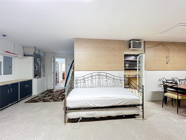 bedroom featuring electric panel