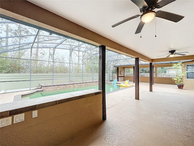 view of patio / terrace with a lanai