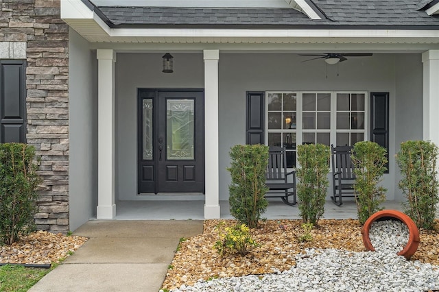 property entrance featuring a porch and ceiling fan