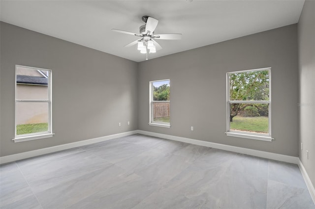 empty room featuring ceiling fan