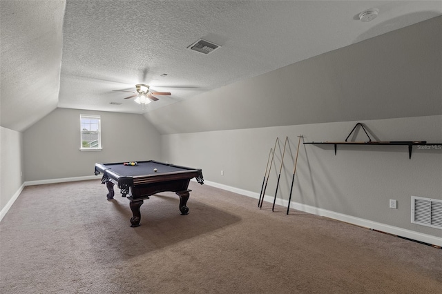 rec room with a textured ceiling, carpet floors, ceiling fan, and pool table