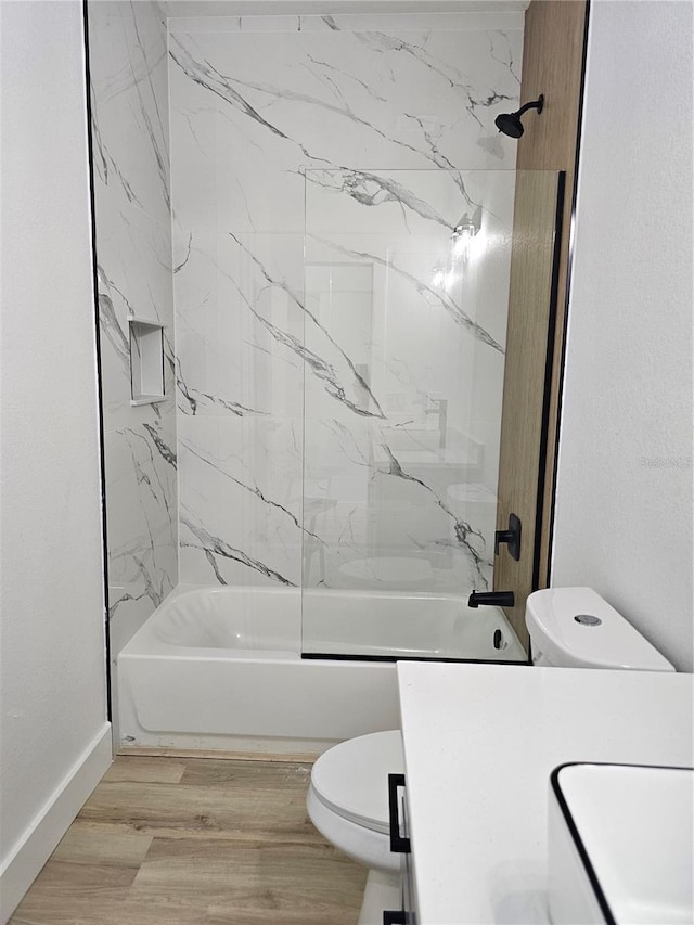 8249 Dimstead St, Port Charlotte, FL 33981 - bathroom with vanity, shower / bathtub combination, and wood finished floors